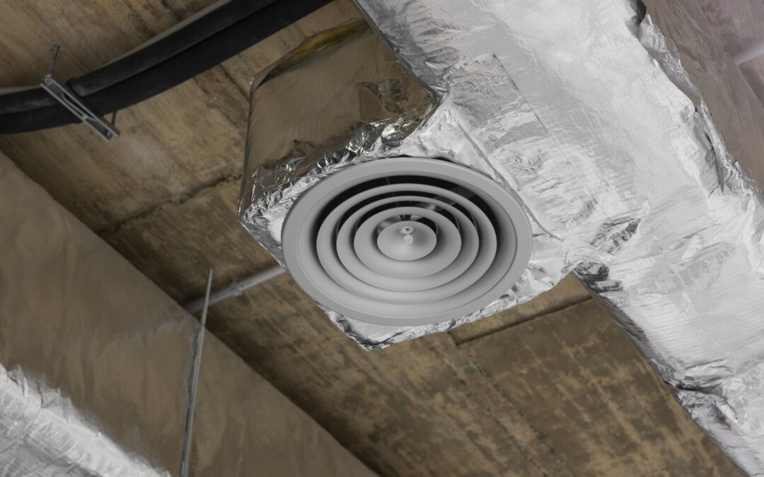 Air duct vent in a metallic duct system, highlighting HVAC components for improved indoor air quality.